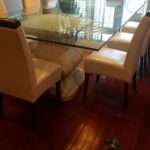 Dining Room Table - Two marble bases with solid extra wide glass top. Seats 12.